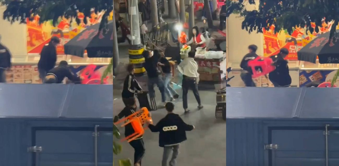 海南万宁富南街夜市精神小伙当街开大 椅子抡飞砸头血溅摊位